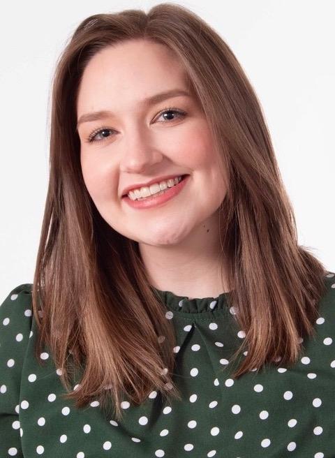 Photo of 2021 Portz Scholar Sarah Hagglund, posing for the camera in green/white polka dot shirt.